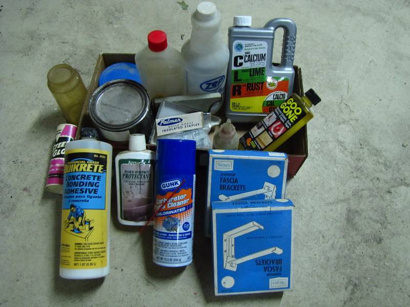 lot 55 image: Household chemicals and wall brackets