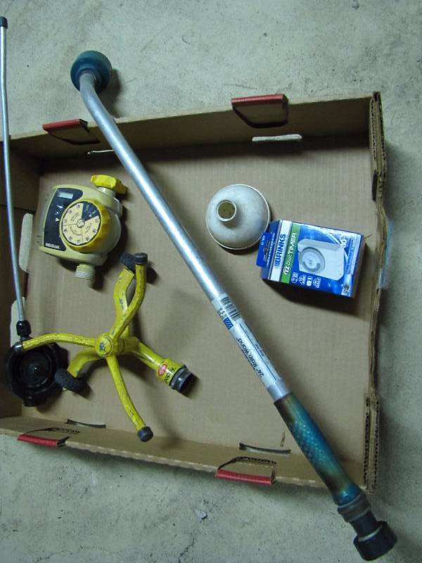 lot 57 image: Garden sprinkler & timer