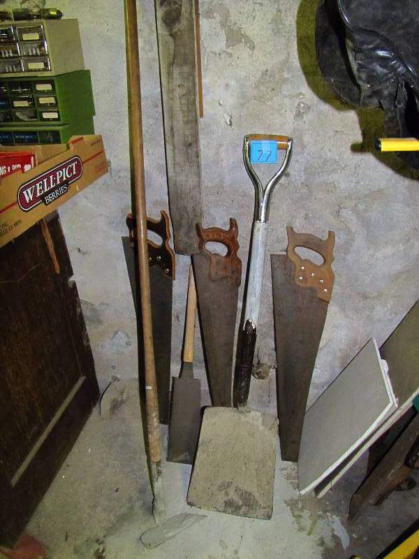 lot 77 image: Vintage hand saws, shovel, spade