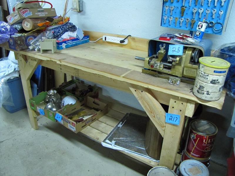 lot 217 image: work bench in basement may need to be partially disassembled