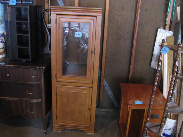 lot 194 image: Tall cabinet with two doors