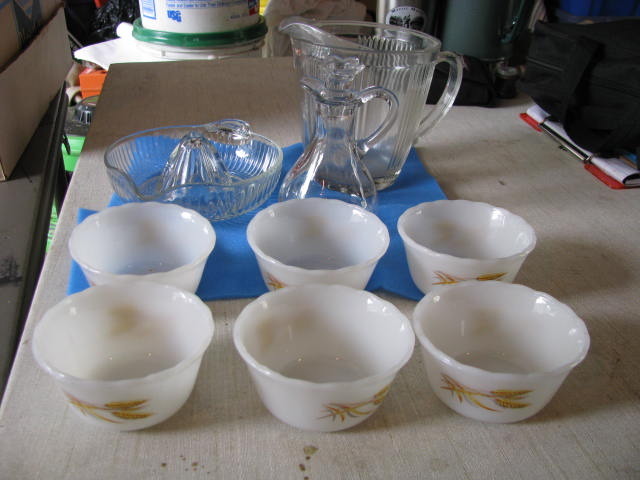 lot 203 image: 6 fire king dessert bowls clear juicer, pitcher and oil bottle