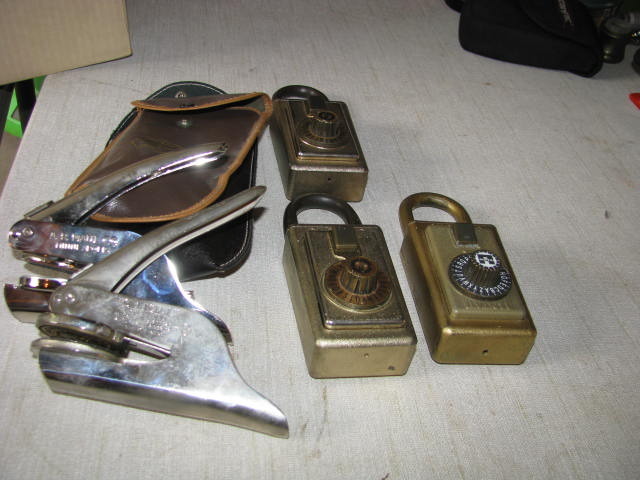 lot 206 image: three vintage lock boxes and two notary stamps