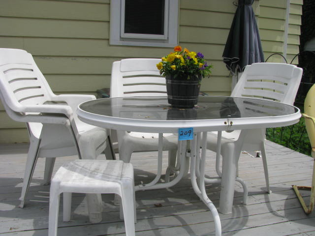 lot 209 image: outdoor white glass top table and 4 plastic chairs