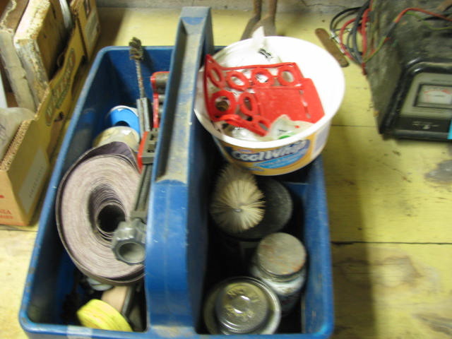 lot 87 image: basket of plumbing supplies