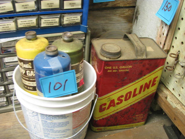 lot 101 image: white gas and gasoline cans