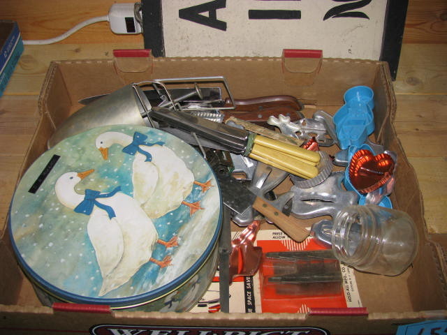 lot 154 image: knives cookie cutters and tins