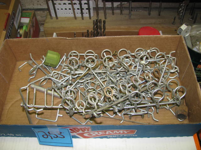 lot 295 image: lot of pegboard hangers see photos