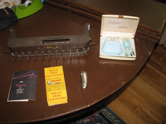 lot 263 image: vintage lady sunbeam laser, lighter, tie rack