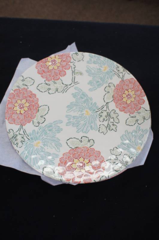 Four Threshold Plastic Floral Plates