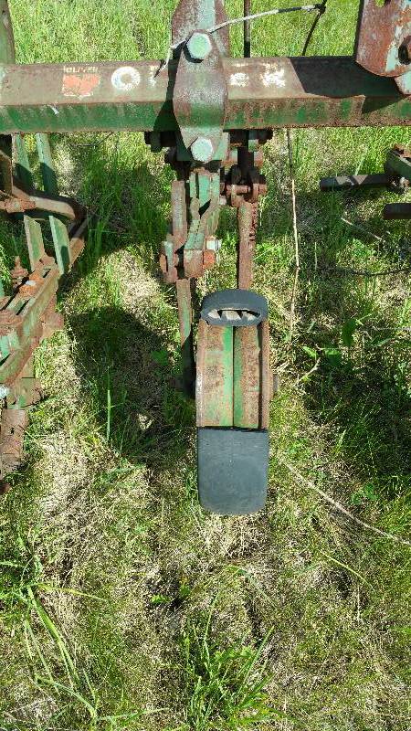 lot 6 image: Oliver Mounted 4 Row Cultivator with Rear 3 Point Track Eradicator