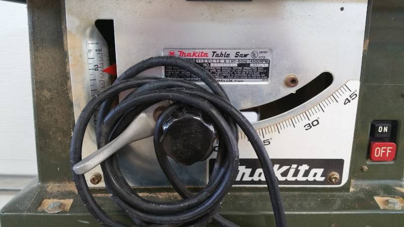 lot 47 image: Makita Table Saw Model #2708 on Stand