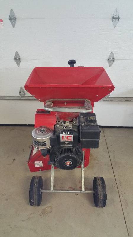 lot 52 image: Troy-Bilt Heavy Duty Chipper  Shredder 8 HP