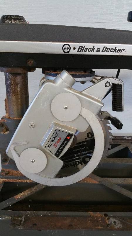 lot 71 image: Black & Decker  Dewalt 10 Radial Arm Saw on Stand