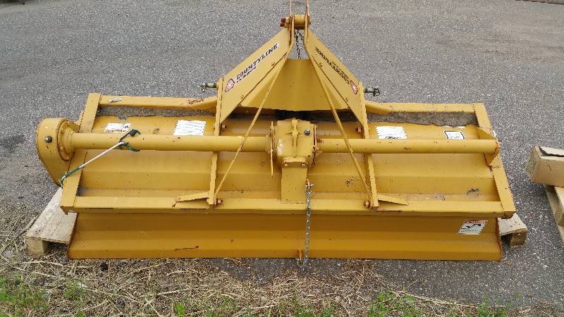lot 93 image: Tractor Supply 6 Rear PTO Driven Tiller