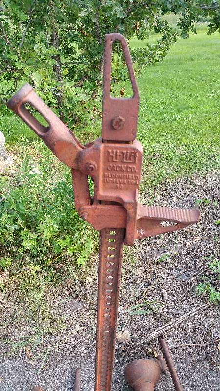 lot 102 image: Group of Tractor Parts, Including Drive Shafts, Etc