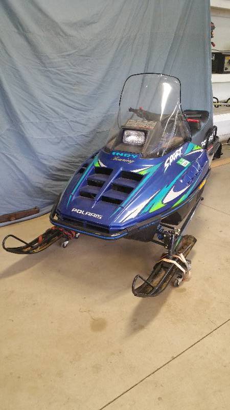 lot 18 image: 1997 Polaris Touring Sport Snowmobile  38.4 Original Miles  Like New