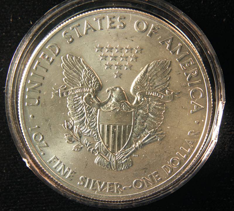 2014 US SILVER EAGLE .999 FINE SILVER IN AIRTIGHT HOLDER