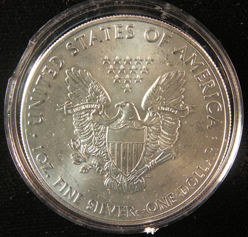2014 US SILVER EAGLE .999 FINE SILVER IN AIRTIGHT HOLDER