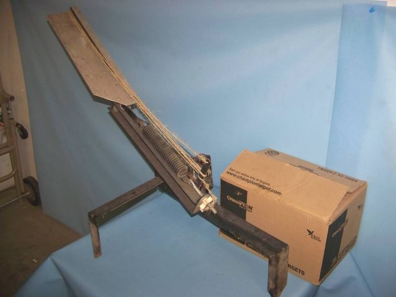 Clay Pigeon Laucher  Thrower and (box) of Champion, Skeet and Trap Clays