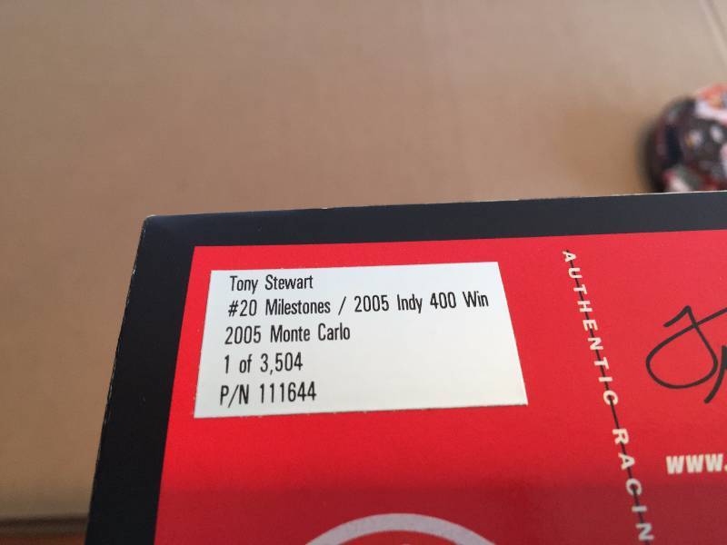 lot 6 image: TONY STEWART #20 MILESTONES 2005 INDY 400 WIN, 2005 MONTE CARLO
