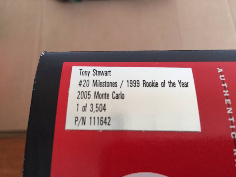 lot 14 image: TONY STEWART #20 HOME DEPOT, MILESTONES, 1999 ROOKIE OF THE YEAR