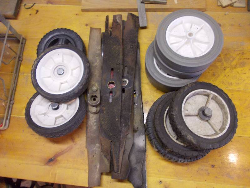 lot 69 image: Lawn Mower Parts-Blades & Wheels