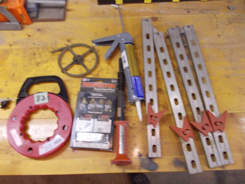 lot 82 image: Fish Tape, Stud Gun, Caulk Gun, Squaring Frames