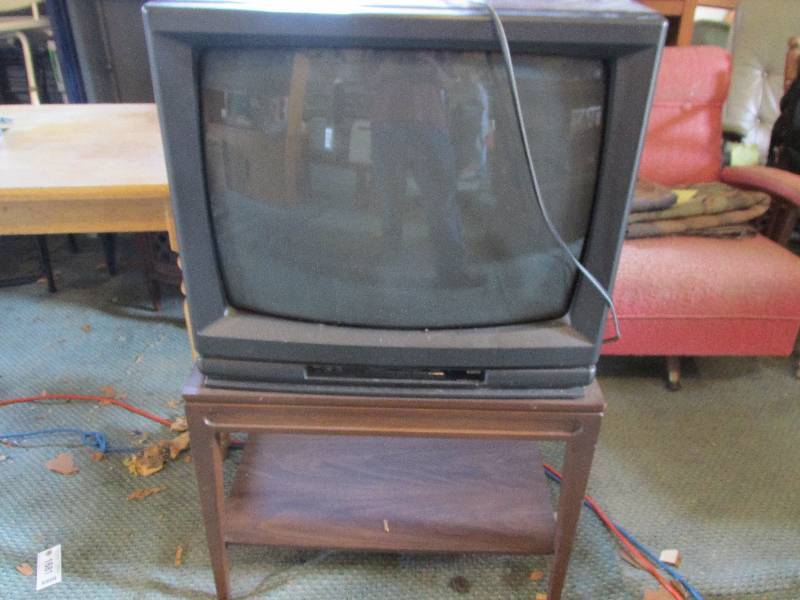 lot 47 image: Vintage TV Stand and tv...