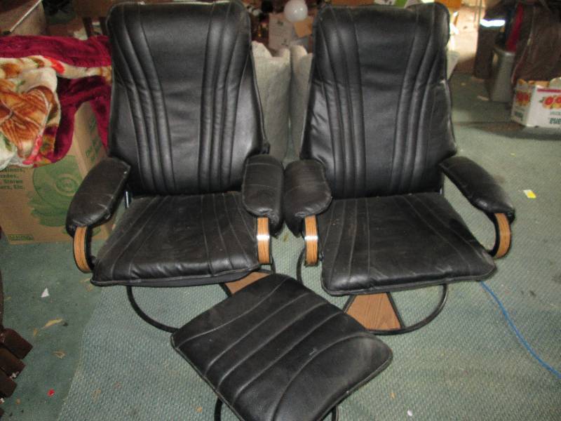 lot 44 image: Pair of vinyl covered swivel chairs...