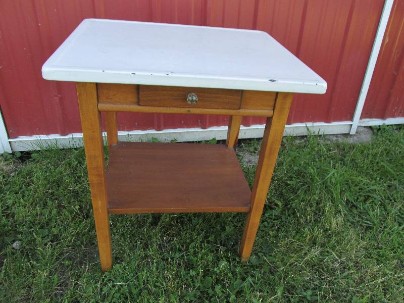 lot 71 image: Table with enameled metal top, 24 x...