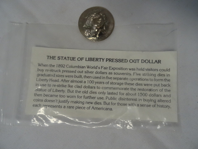 lot 203 image: Silver dollar