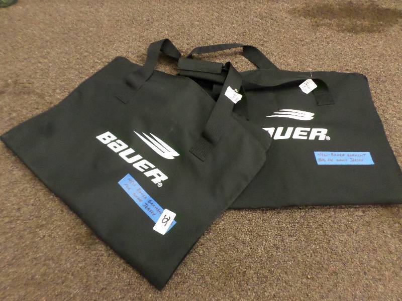 lot 35 image: (2) New Bauer Garment Bags For Game...