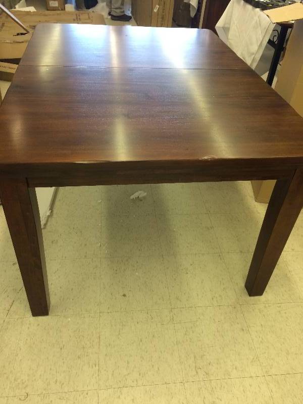 lot 36 image: heavy duty hard wood table  comes with a leaf