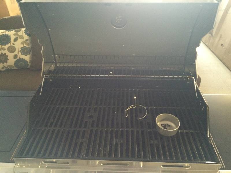 lot 82 image: Char-Broil 4-Burner Gas Grill, Stainless SteelBlack retail $199