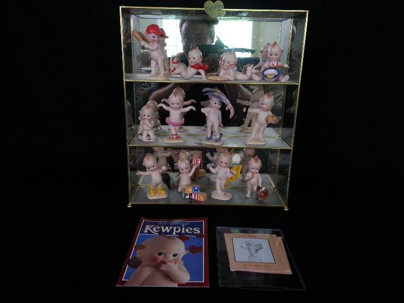 lot 83 image: Set of (12) Kewpies Firgurines, Display, and Material