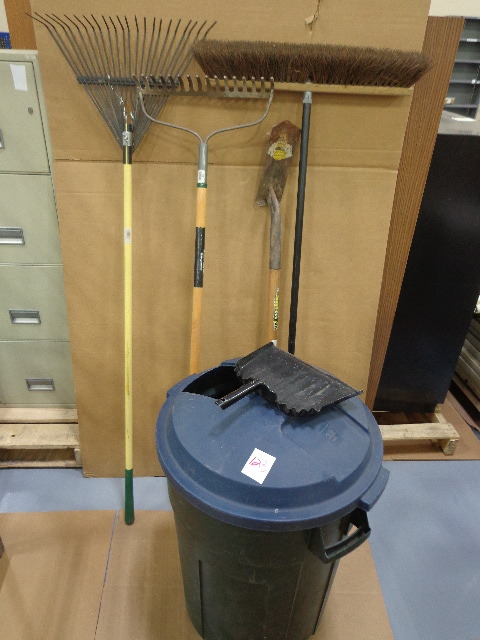 lot 123 image: garbage can and yard tools