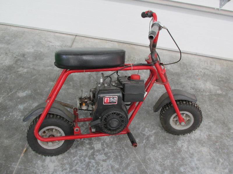 lot 24 image: Kids 2 wheel motor bike with Tecums...