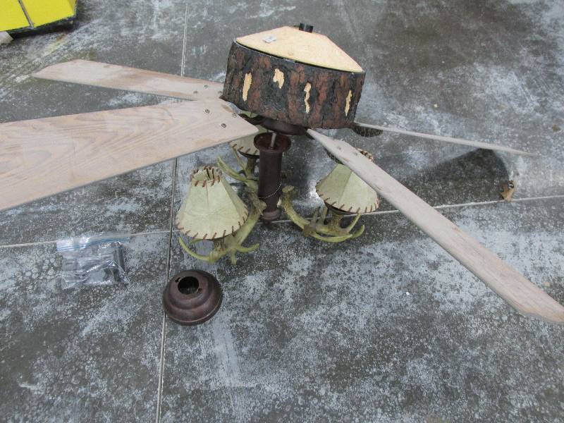 lot 26 image: Rustic looking ceiling fan with lig...
