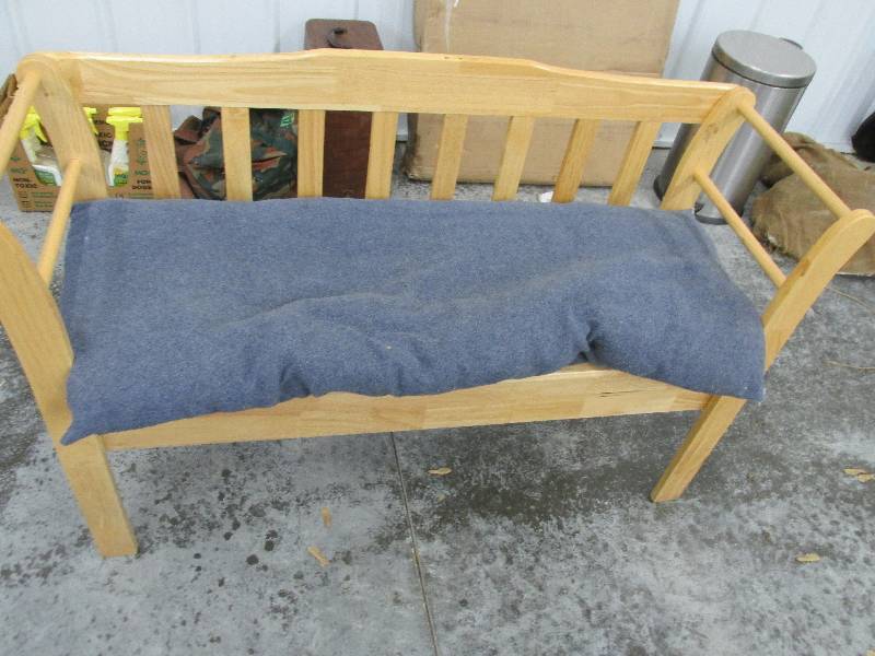 lot 36 image: Wood bench with seat pad, storage c...