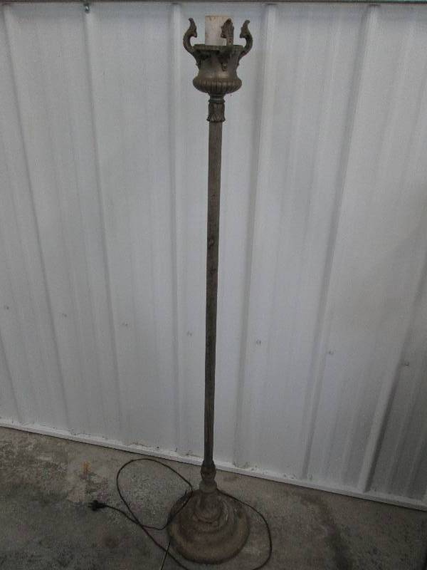 lot 62 image: Antique metal lamp with wide base b...