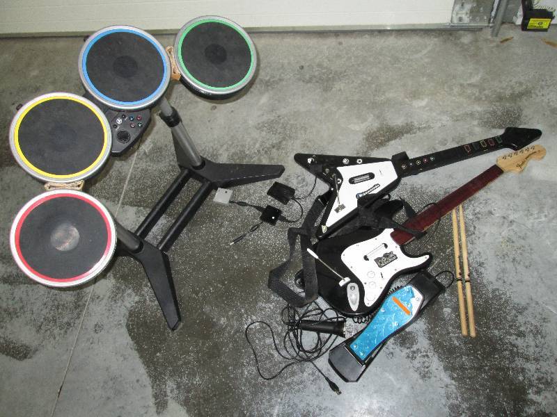 lot 68 image: RockBand drum and guitar accessorie...