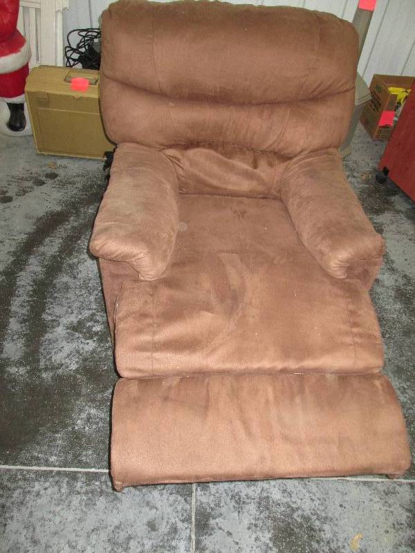 lot 76 image: Dark brown plush recliner...