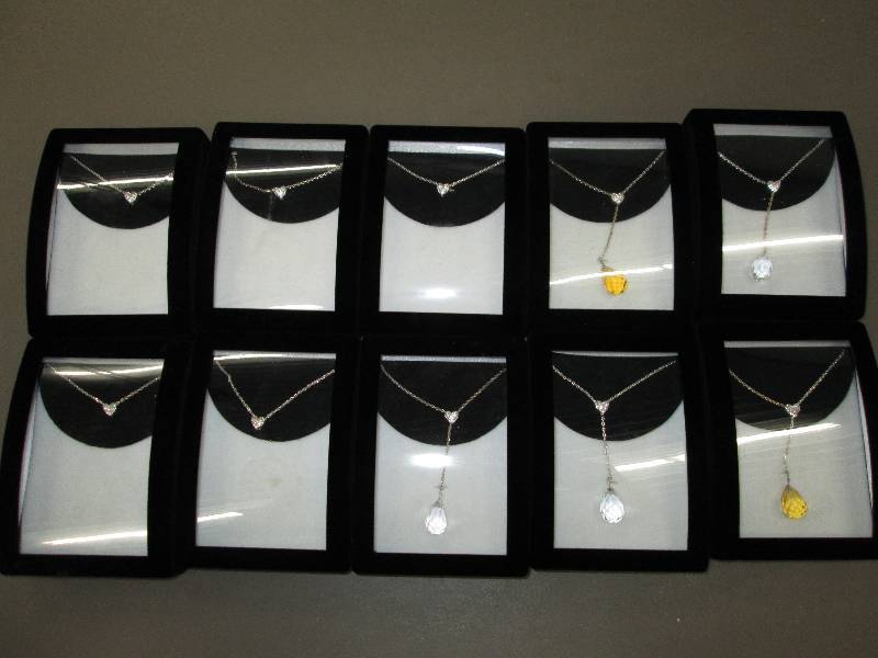 lot 101 image: Lot of brand new necklaces in cases...