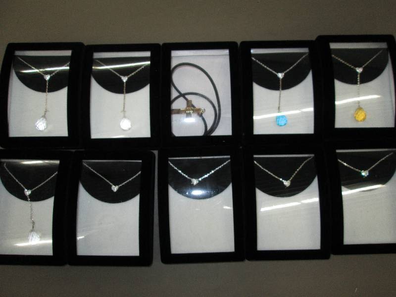 lot 102 image: Lot of brand new necklaces in cases...