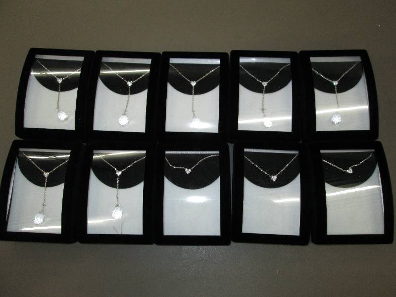 lot 104 image: Lot of brand new necklaces in cases...