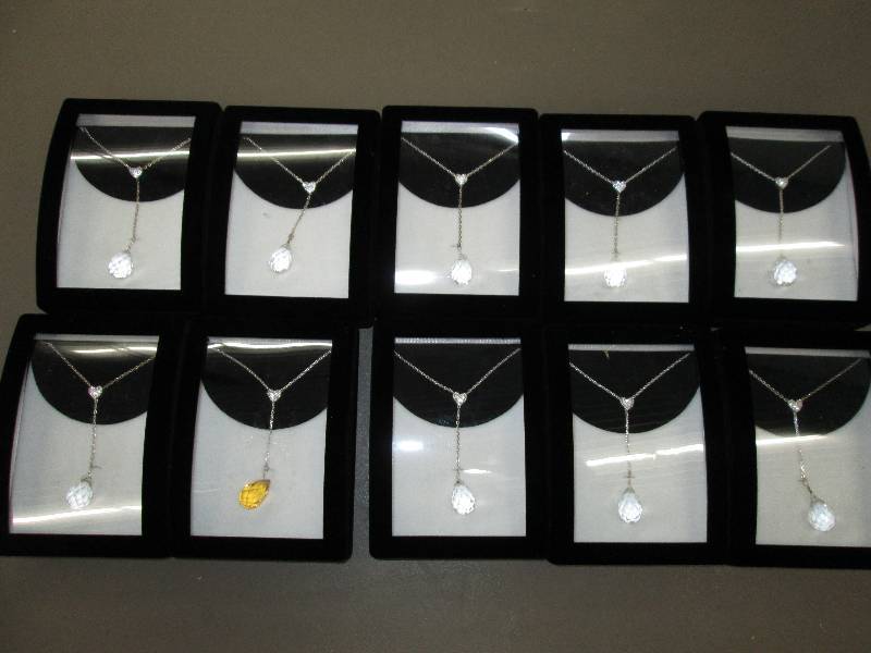 lot 105 image: Lot of brand new necklaces in cases...