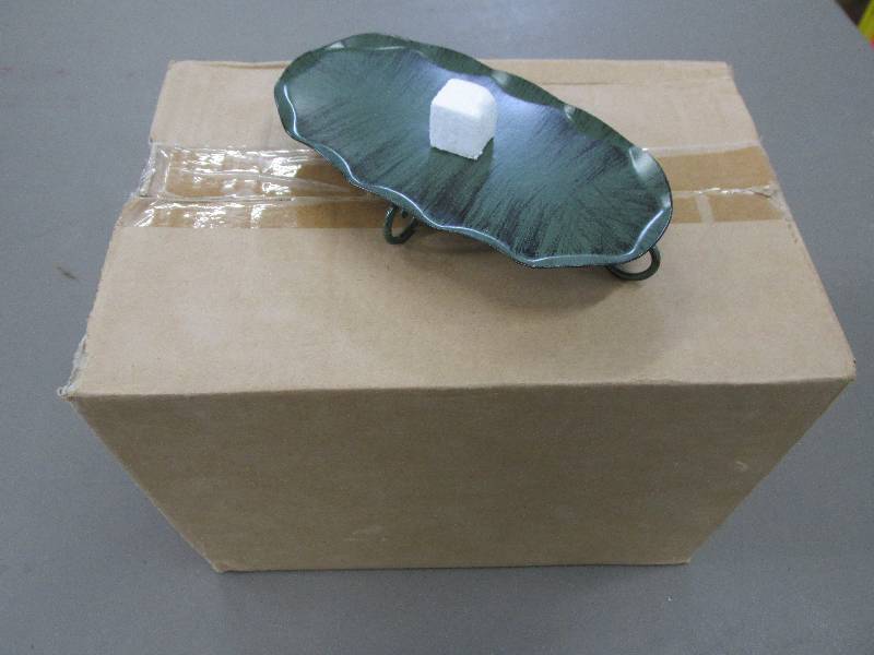 lot 125 image: Box of 16 pine themed metal candle ...
