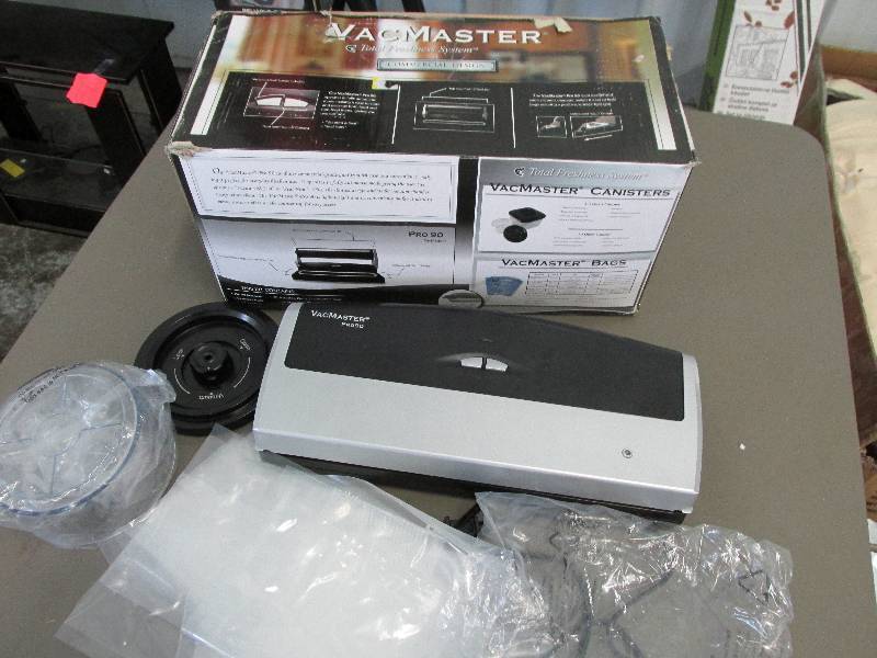 lot 184 image: Vacmaster sealer with bags...