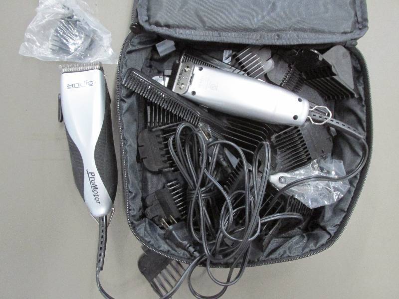 lot 191 image: Pair of Andis electric shavers with...